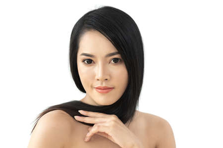 Beautiful woman beauty health care with black long shiny straight smooth hair isolated on white background.Hair cosmeticsの写真素材