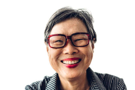 Portrait of happy senior adult elderly asia women smiling and looking at camera on white...