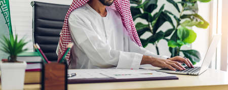 Successful of arab business partner handshake together in modern office.Partnership approval and thanks gesture conceptの写真素材