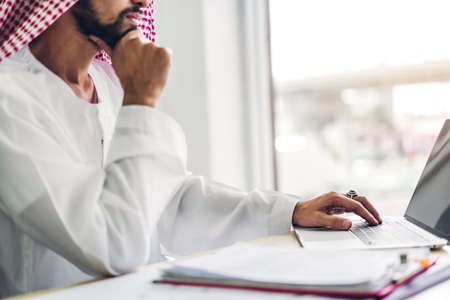 Successful of arab business partner handshake together in modern office.Partnership approval and thanks gesture conceptの写真素材