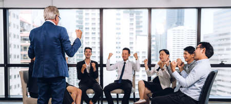Group of professional business meeting and discussing strategy with new startup project.Creative business people planning and brainstorm with document report in modern workloft.Teamwork conceptの写真素材