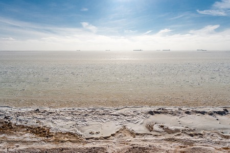 Beautiful winter seascape. Black Sea is covered with ice. The northern coast of the Black Sea region of Odessa, Ukraine.の写真素材