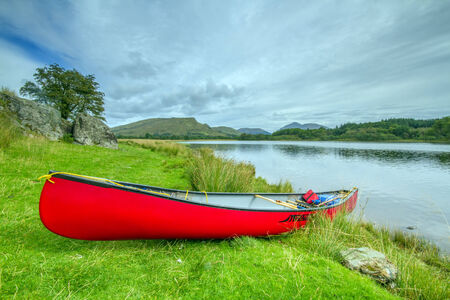 Shot of Canoo on banks of Scottish Lochの写真素材