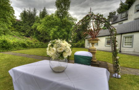 A shot of a bridal table at an outdoor weddingの写真素材