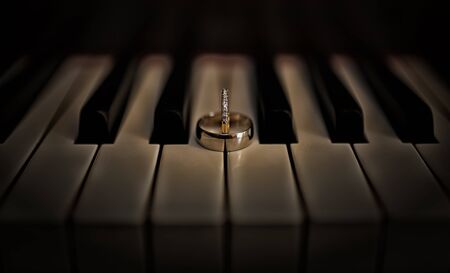 Rings on pianoの写真素材