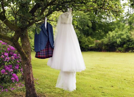 Shot of a Kilt and Wedding dressの写真素材