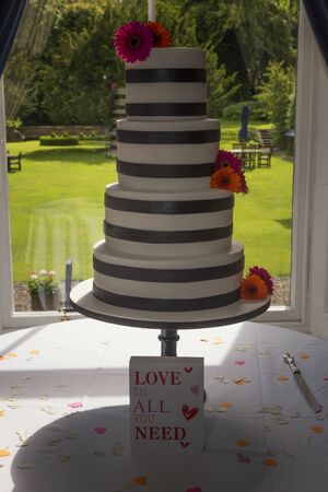 Shot of a stunning wedding cake in natural lightの写真素材