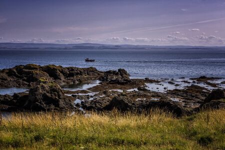 Dramatic rocky coastline in Elie Scotlandの写真素材