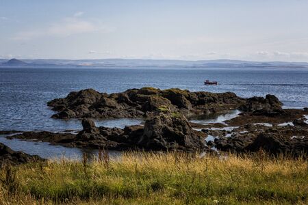 Dramatic rocky coastline in Elie Scotlandの写真素材