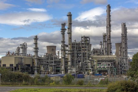 Close shot of an oil refinery on a cloudy day