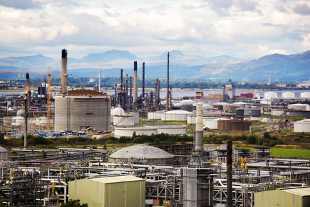 Close shot of an oil refinery on a cloudy dayの写真素材