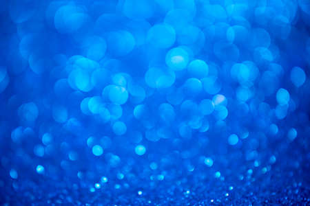 Blue glitter christmas abstract background. Defocused sequin light.の写真素材