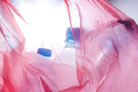 Plastic bottles in the package. Recycle waste management concept.の写真素材