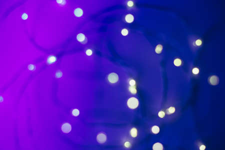 Blured background with led garland. Trendy neon colors with gradient.の写真素材