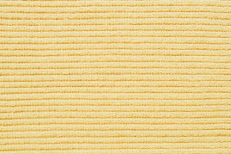 Light yelow knitting wool texture for your background.