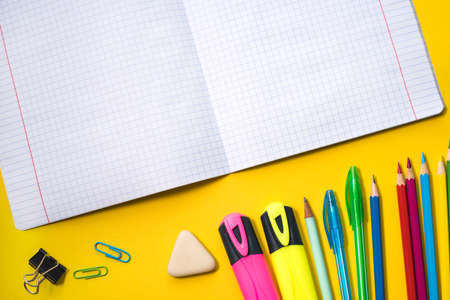 School supplies on yellow background. Top view. Copy space.の写真素材