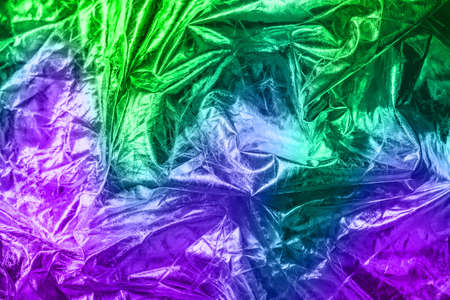 The texture of the crumpled fabric for your background. Trendy neon colours. Place for your text.の写真素材