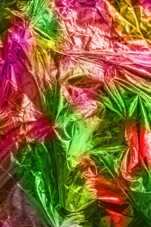 The texture of the crumpled fabric for your background. Trendy pink and green colours. Place for your text.の写真素材