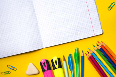 School supplies on yellow background. Top view. Copy space.の写真素材