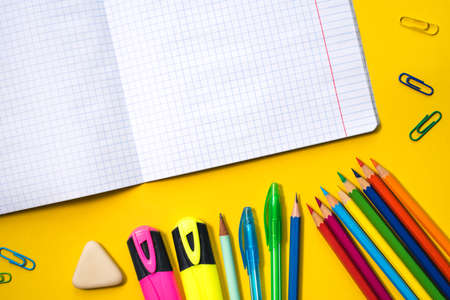 School supplies on yellow background. Top view. Copy space.の写真素材