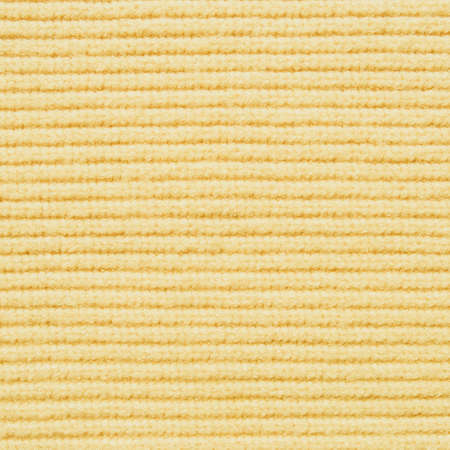 Light yelow knitting wool texture for your background.の写真素材