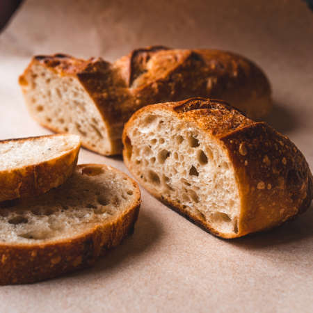 Fresh sliced bread on kraft paper. Close up.の写真素材