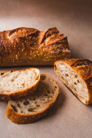 Fresh sliced bread on kraft paper. Close up.の写真素材
