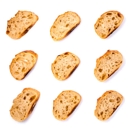 Pattern with pieces of white bread isolated on white background. Top view.の写真素材