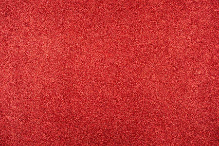 Abstract background with red sequins texture. Holiday concept.の写真素材