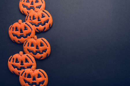 Dark background with halloween pumpkins. Copy space for your text.の写真素材