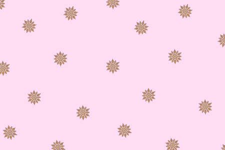 Winter pattern made of snowflakes and on pink background. Christmas concept. Flat lay.の写真素材