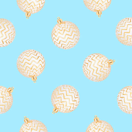 Pattern of Christmas balls on blue background. Flat lay, top view.の写真素材