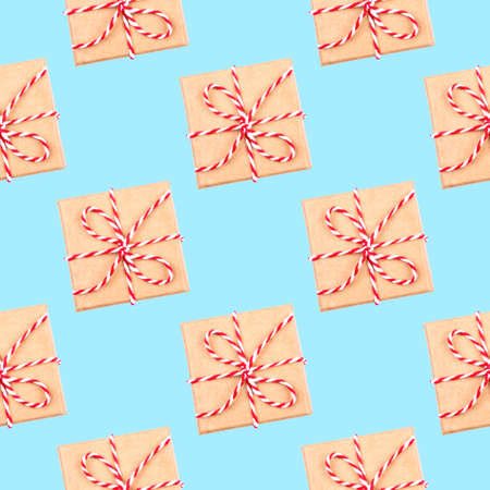 Pattern of gift boxes blue background. Flat lay, top view.の写真素材