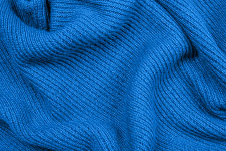 Blue knitted fabric texture for your background. Main color of year 2020.の写真素材