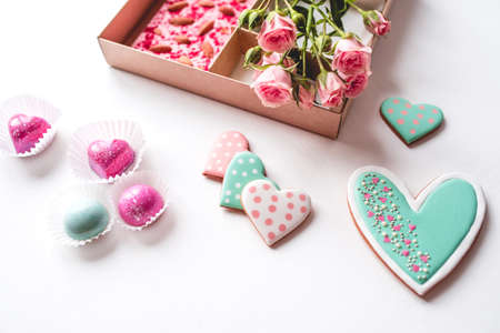 Gift set with hand made sweets in a box on a white table. Flat lay, top view.の写真素材