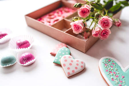 Gift set with hand made sweets in a box on a white table. Flat lay, top view.の写真素材