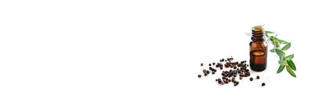 Black pepper essential oil isolated on white background for beauty, skin care, wellness and medicinal purposes. Piper nigrum oilの写真素材