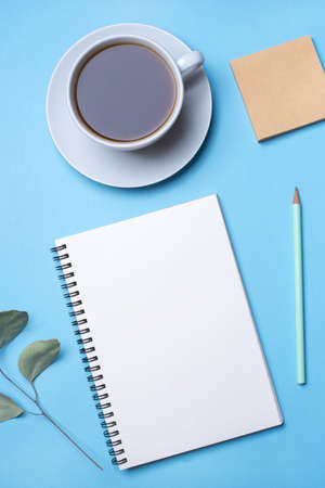 Flat lay photo of a freelancer workspace desk with copy space background. Top view.の写真素材