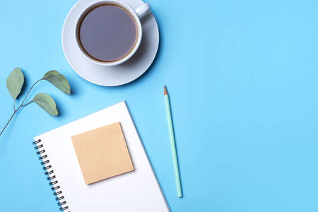 Flat lay photo of a freelancer workspace desk with copy space background. Top view.の写真素材