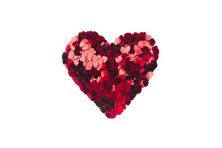 Heart of small red hearts isolated on a white background. Valentine's day concept. Flat lay, top view.の写真素材
