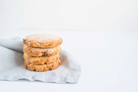 Stacked cookies on a linen napkin. Close up.の写真素材