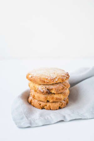 Stacked cookies on a linen napkin. Close up.の写真素材