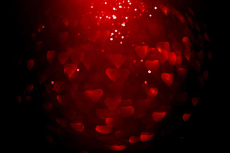Background with red bokeh in the shape of a heart. Valentine's day concept.