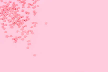 Pink background with tiny hearts. Valentines day concept. Top view.の写真素材