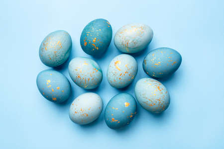 Easter background of eggs painted in blue color. Flat lay, top view.の写真素材