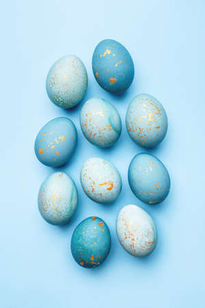 Easter background of eggs painted in blue color. Flat lay, top view.の写真素材
