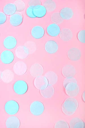 Mint confetti on pink background. Flat lay, top view.の写真素材