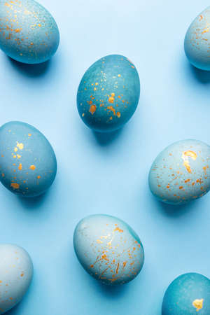 Easter background of eggs painted in blue color. Flat lay, top view.の写真素材