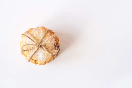Stack of fresh cookies on white wooden table. Close up.の写真素材