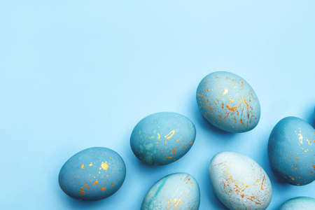Easter frame of eggs painted in blue color. Flat lay, top view.の写真素材